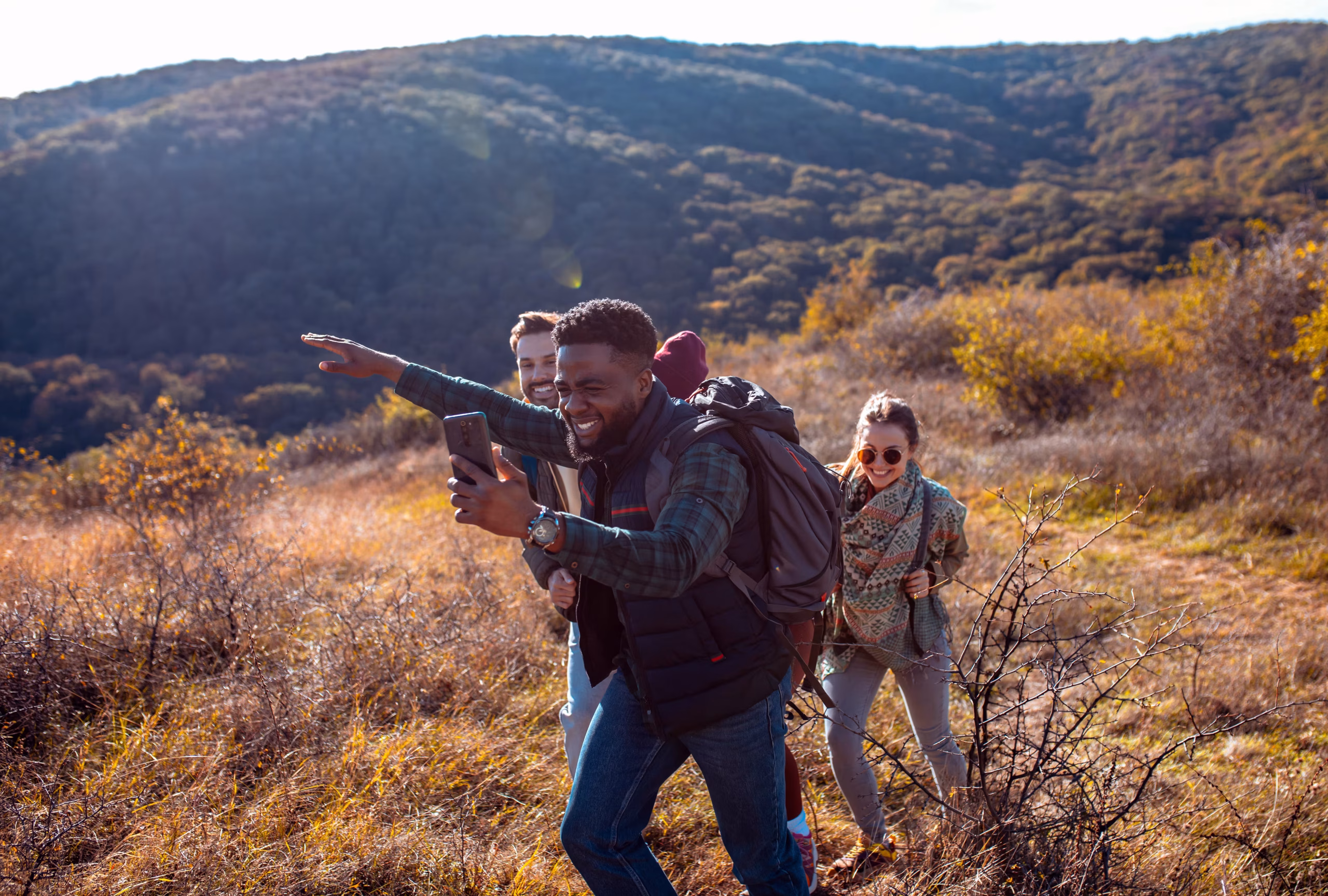 Walking safari in bush with armed guide